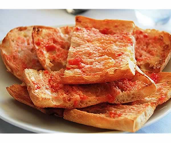 Rebanadas de Pan con tomate, ajo y aceite